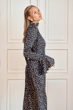 Elegant midi dress with decorative scarf